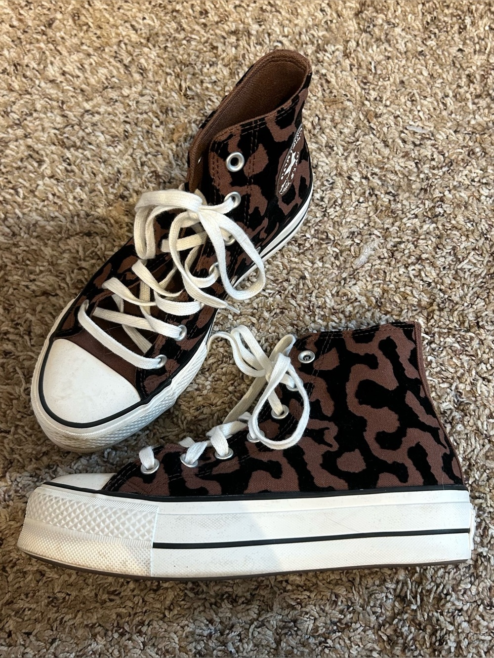 Converse Chuck Taylor All Star Lift Platform hi tops sneakers in Leopard Remix